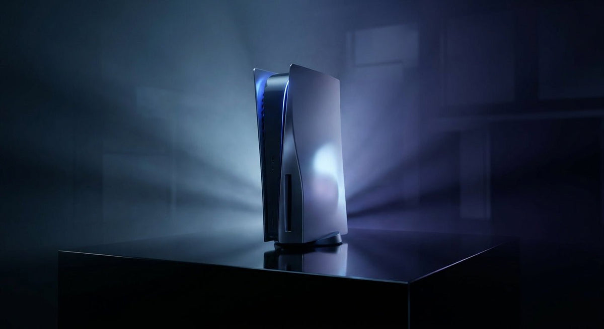 A next-generation Sony PlayStation 5 Pro gaming console displayed dramatically under cool blue studio lighting on a dark reflective surface.